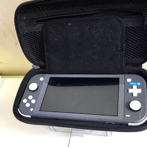 Like new grey nintendo switch lite with carrying case